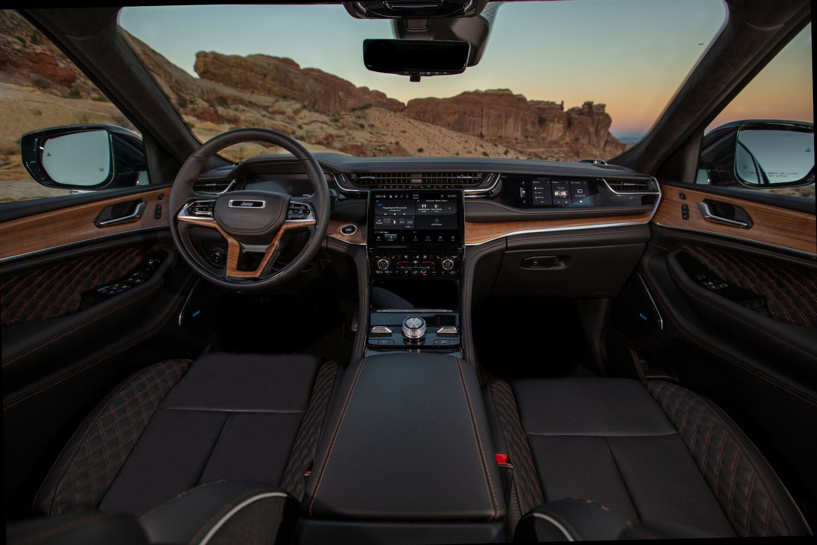 2026 Jeep Grand Cherokee 4xe - interior view of the 2026 Jeep Grand Cherokee's dashboard and black leather seats - Cooksville Dodge, Chrysler, Jeep, RAM - New car dealership in Mississauga, Ontario