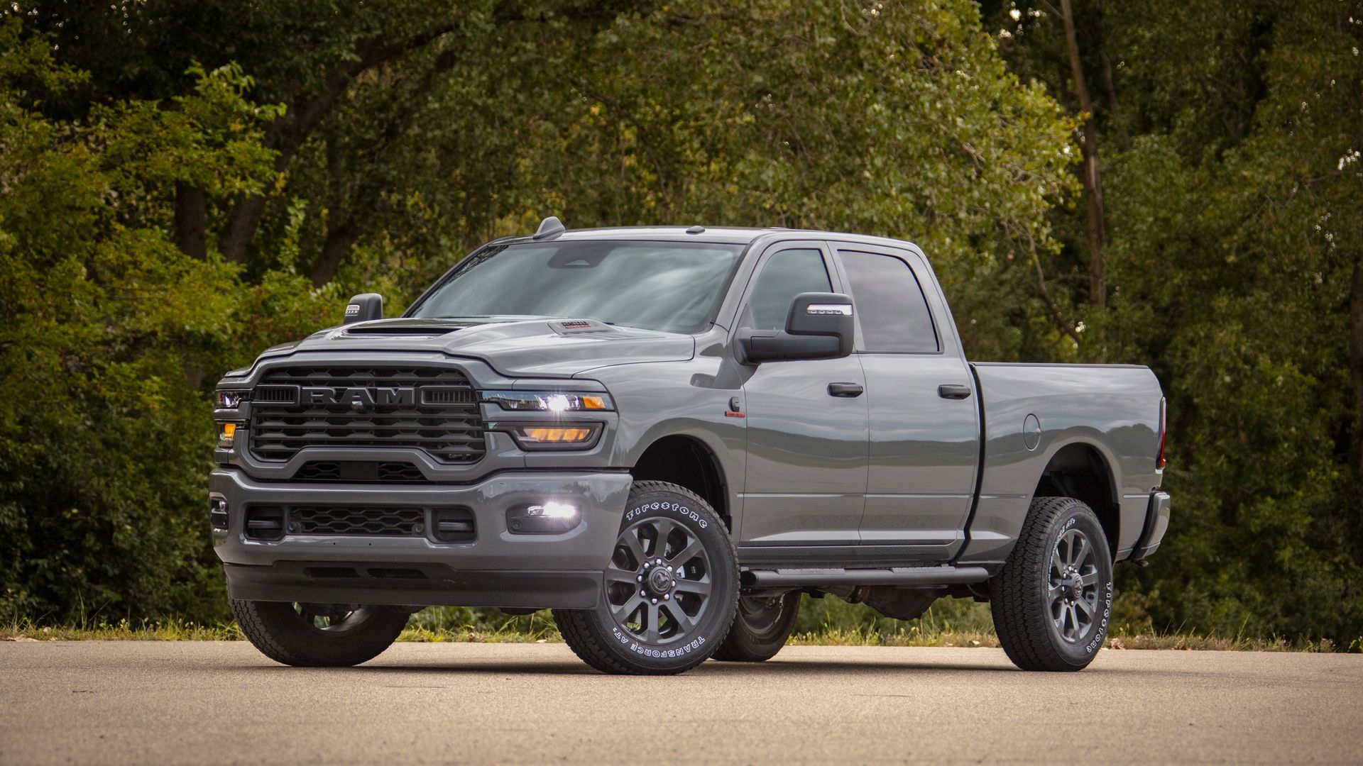 2026 Ram 2500 Heavy Duty - Front three-quarter view of a grey Ram 2500 Heavy Duty parked on a paved road - Cooksville Dodge Chrysler Jeep RAM - New car dealership in Mississauga, Ontario