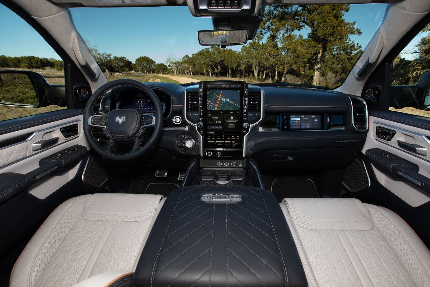 2026 Ram 1500 Tungsten - Interior view of the dashboard, infotainment screen, and premium front seats of a Ram 1500 Tungsten - Humberview Group - New car dealerships in Ontario