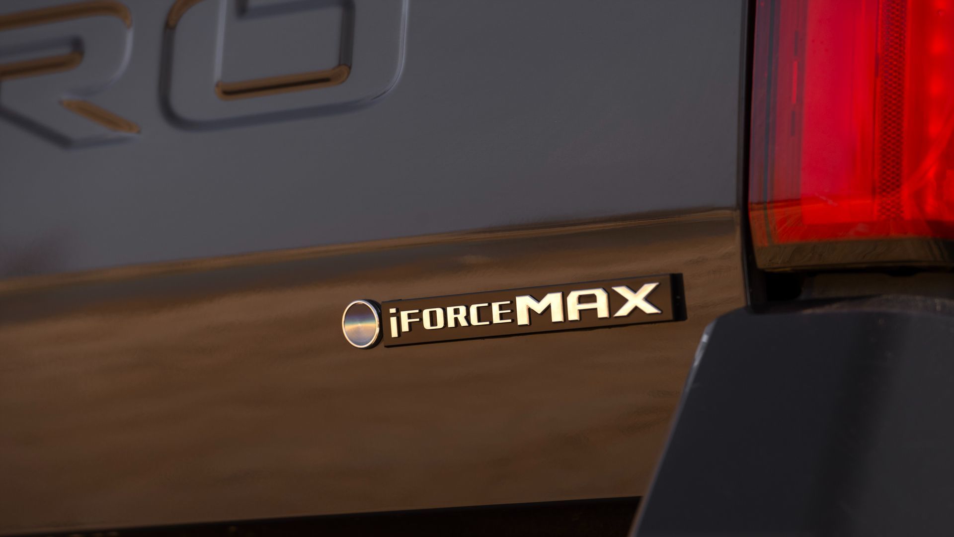 2026 Toyota Tacoma - Close-up of the i-FORCE MAX hybrid engine badge - Goderich Toyota - New car dealership in Goderich, Ontario