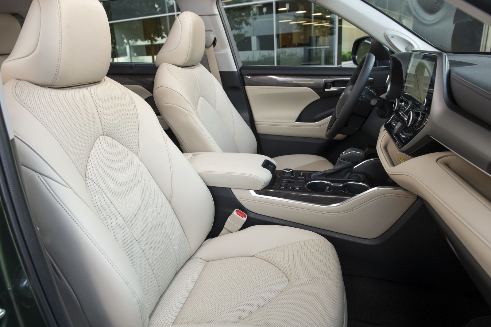 2026 Toyota Highlander - interior view of the beige leather front seats and center console - Orangeville Toyota - New car dealership in Orangeville, Ontario
