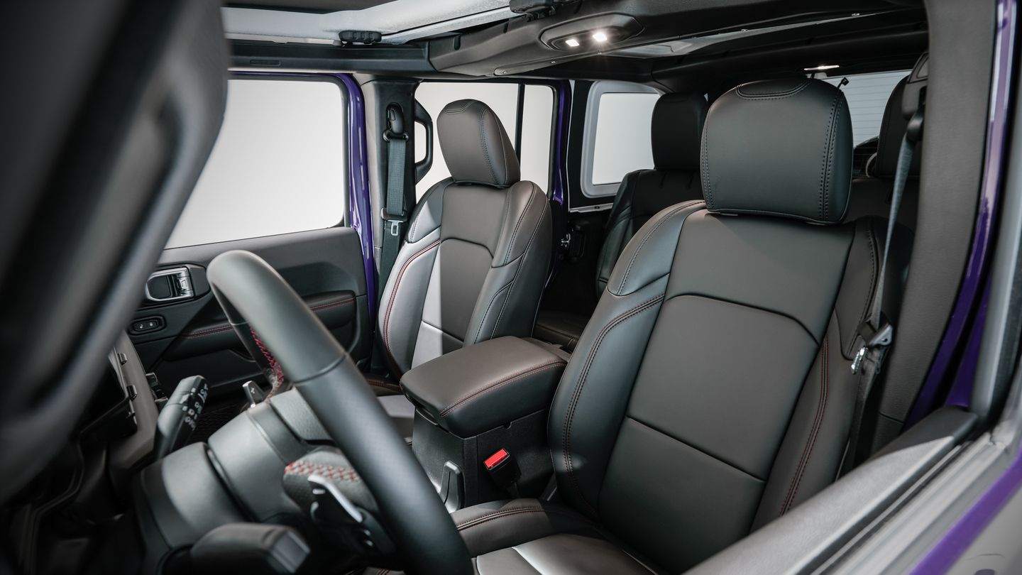 2026 Jeep Wrangler - interior view of the black leather front seats with red stitching - Cooksville Dodge - New car dealership in Mississauga, Ontario