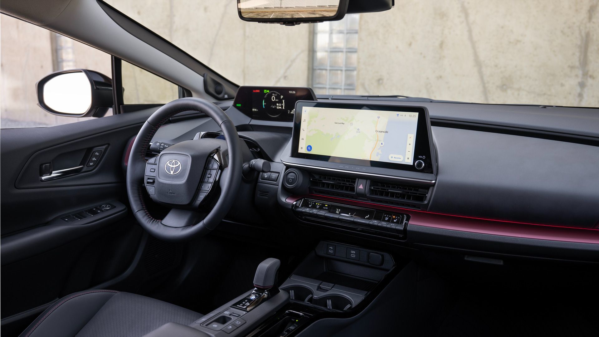 2026 Toyota Prius PHEV - interior view of the dashboard and steering wheel of a 2026 Toyota Prius PHEV - Oakville Toyota - New car dealership in Oakville, Ontario