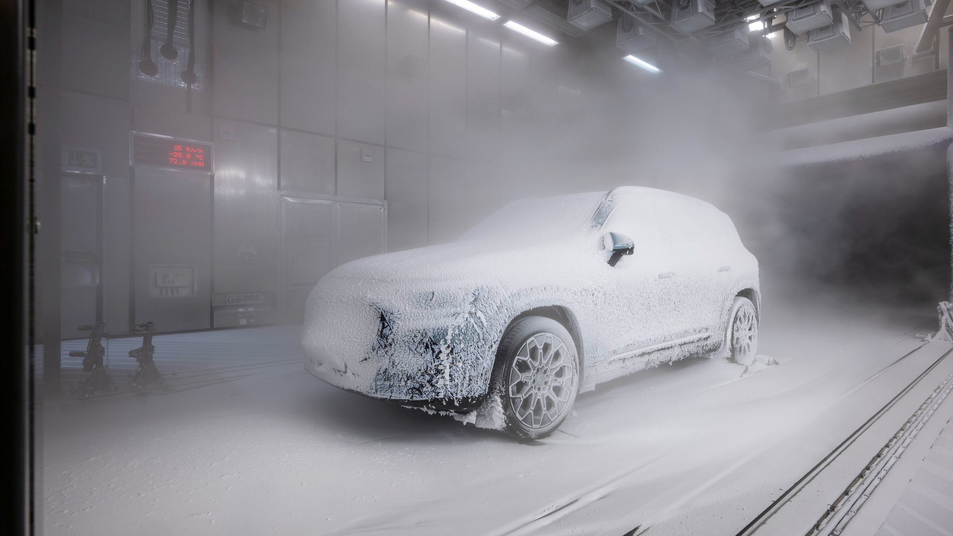 2026 Mercedes-Benz EQB - front view of a 2026 Mercedes-Benz EQB covered in snow during wind tunnel testing - Mercedes-Benz Brampton - New car dealership in Brampton, Ontario