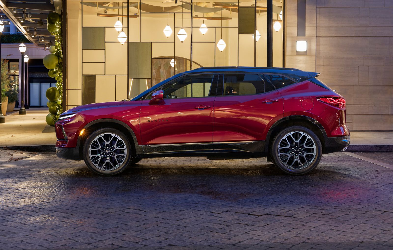 Chevrolet Blazer RS - a red Chevrolet Blazer RS parked on a cobblestone street at night - Autopark Barrie - Used car dealership in Barrie, Ontario
