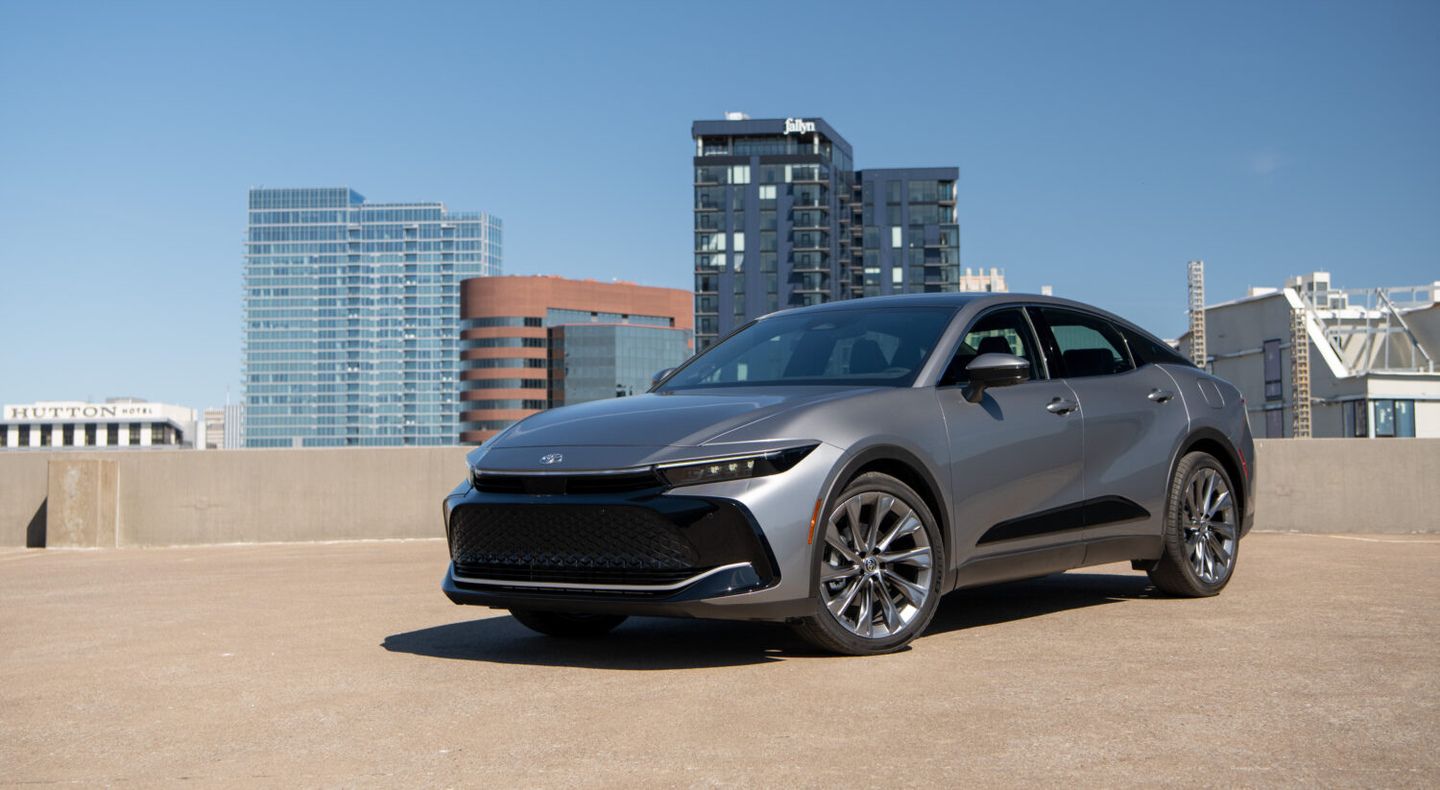 2026 Toyota Crown - a grey 2026 Toyota Crown parked on a rooftop with a city skyline background - Humberview Group - New car dealerships in Ontario