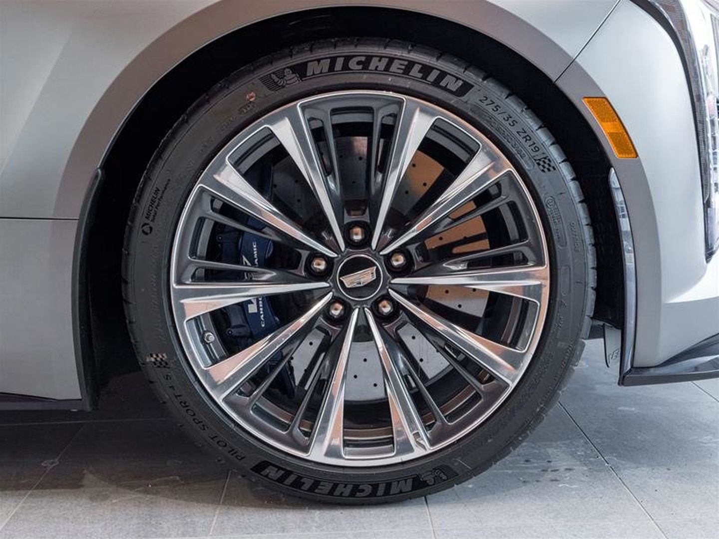 2026 Cadillac CT5-V Blackwing - close-up of the 19-inch aluminum alloy wheel with Michelin Pilot Sport 4S tires and blue brake calipers - Applewood Cadillac - Cadillac new car dealership in Mississauga, Ontario