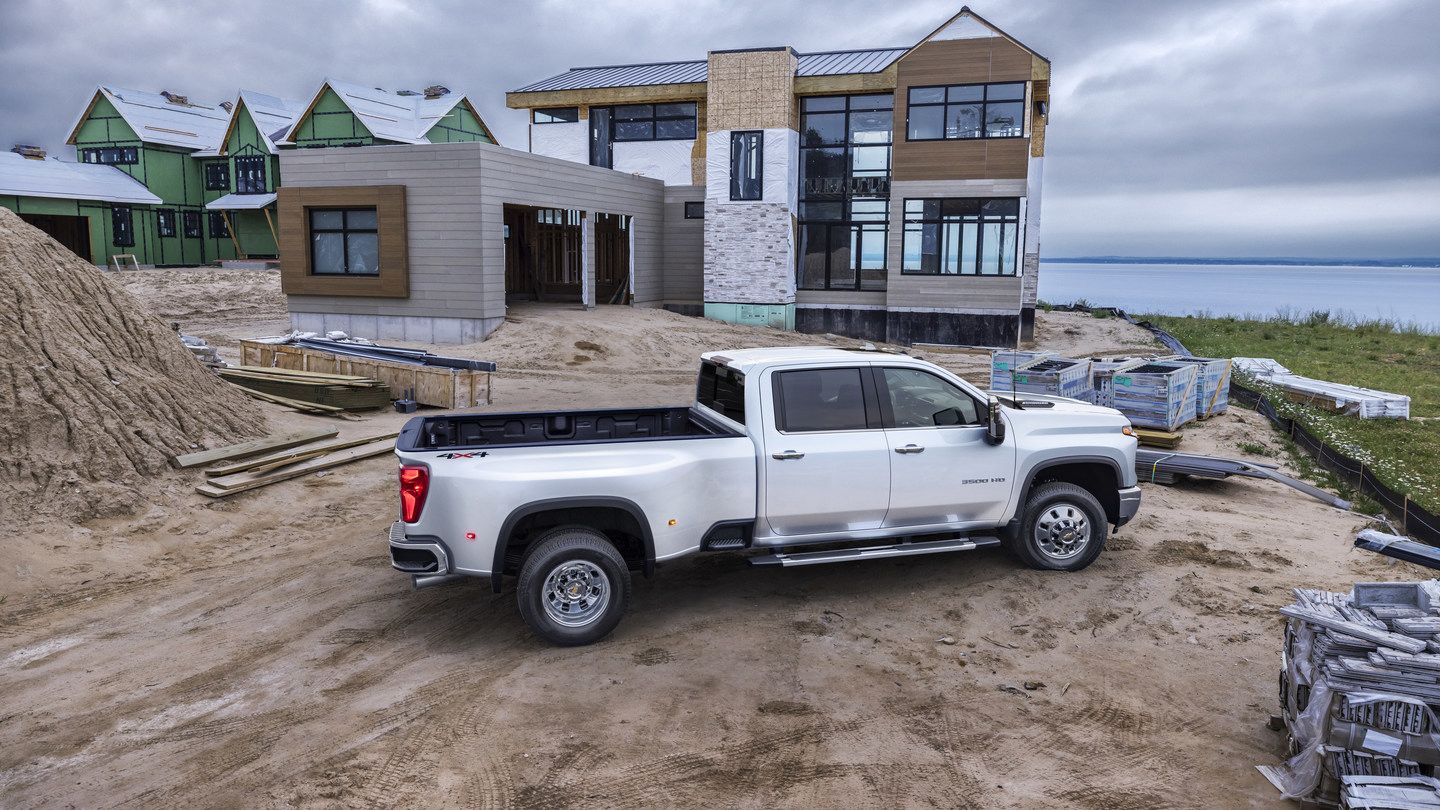 2026 Chevrolet Silverado 3500HD LTZ - a white 2026 Chevrolet Silverado 3500HD LTZ dually parked at a residential construction site - Humberview Group - New car dealerships in Ontario