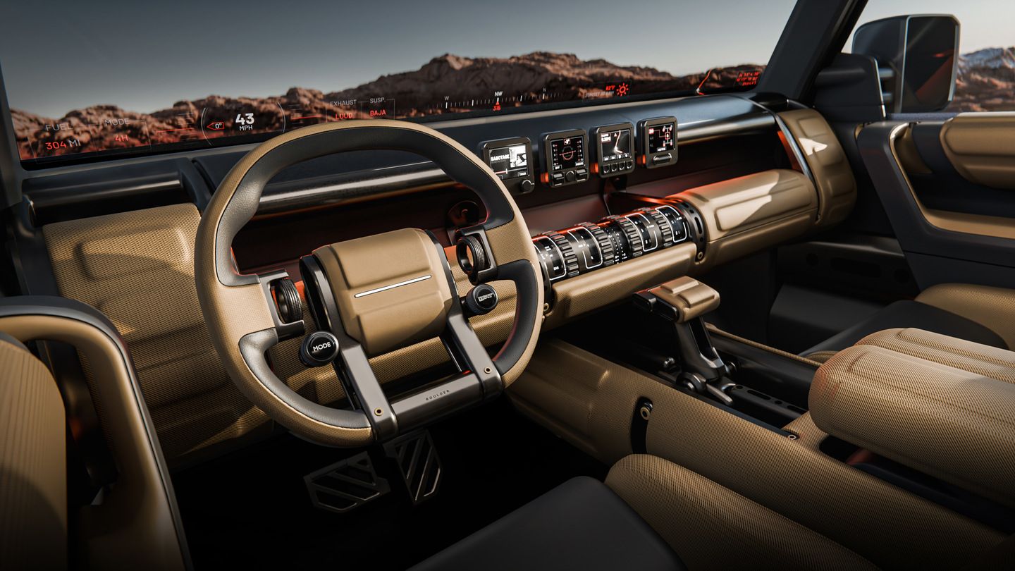 Hyundai Boulder - interior view of the 2026 Hyundai Boulder's futuristic dashboard and tan leather upholstery - Woodstock Hyundai - New car dealership in Woodstock, Ontario