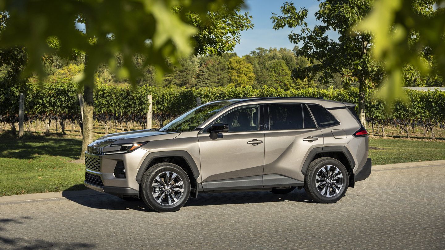 2026 Toyota RAV4 - a bronze 2026 Toyota RAV4 Limited parked beside a vineyard - Humberview Group - New car dealerships in Ontario