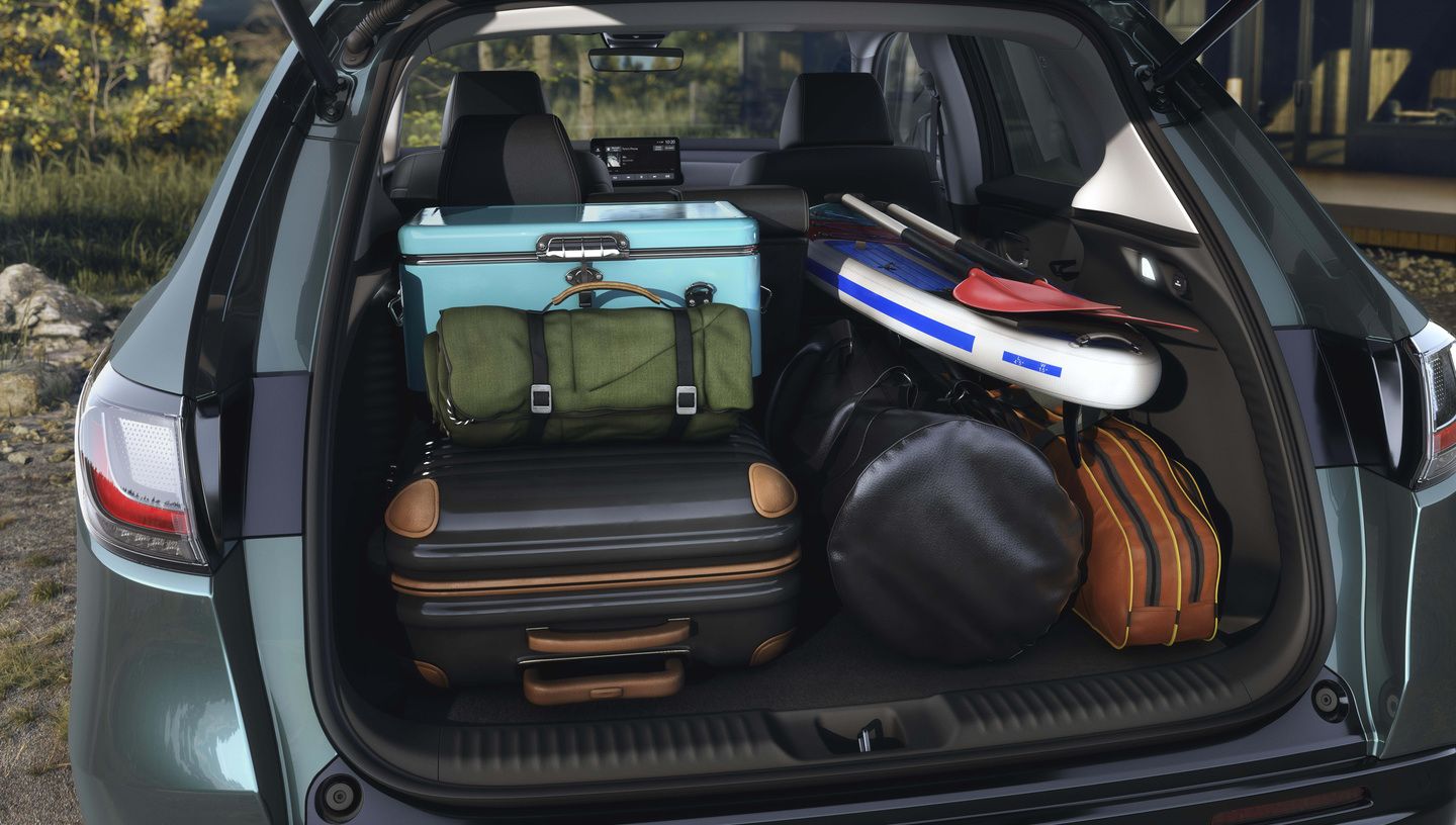 2026 Honda HR-V - view of the open trunk of a 2026 Honda HR-V filled with luggage and outdoor gear - Orangeville Honda - New car dealership in Orangeville, Ontario
