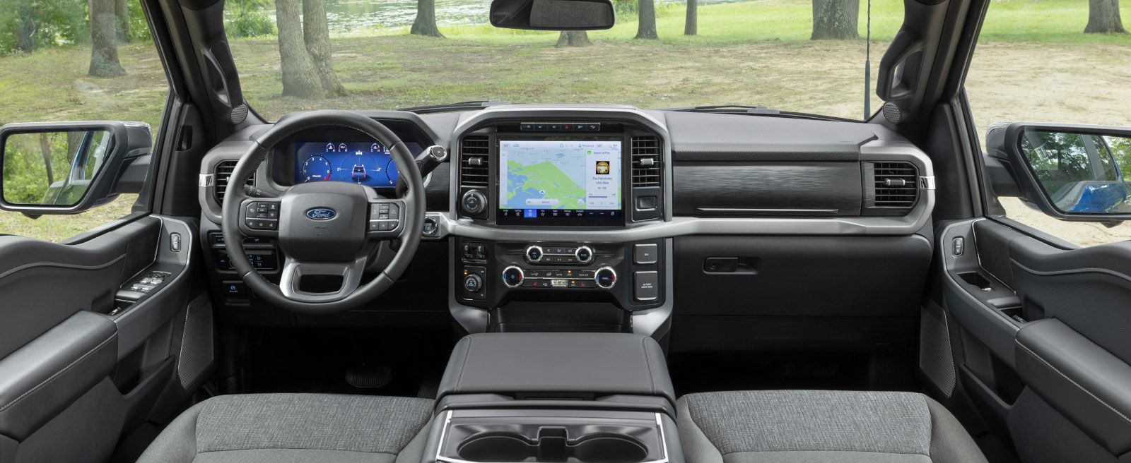 2026 Ford F-150 XLT - interior view of the dashboard, steering wheel, and central touchscreen infotainment system - Mayfield Ford - New car dealership in Brampton, Ontario