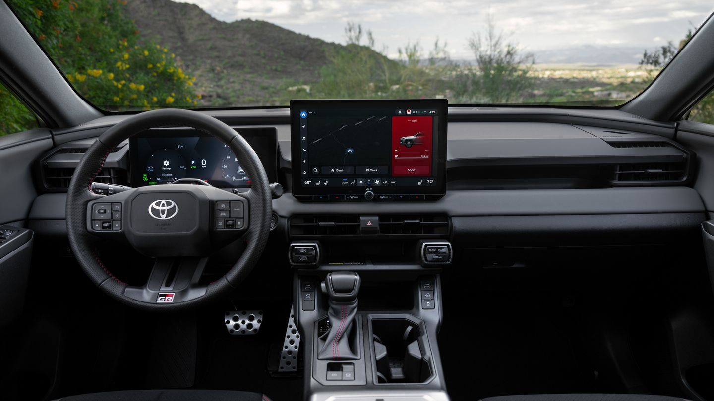 2026 Toyota RAV4 PHEV - Interior view of the dashboard, steering wheel, and infotainment screen of a Toyota RAV4 PHEV GR Sport - Goderich Toyota - New car dealership in Goderich, Ontario