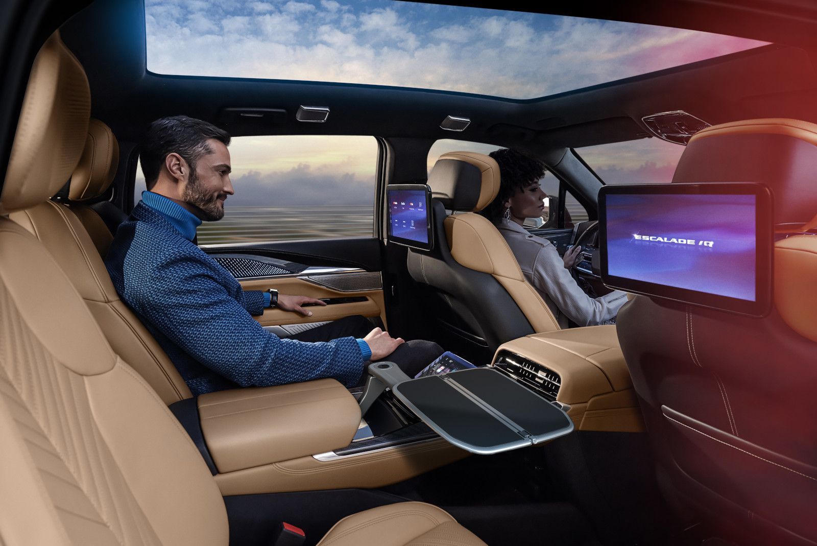 2026 Cadillac Escalade IQ - Interior view of the rear passenger executive seating and entertainment screens in a Cadillac Escalade IQ - Applewood Cadillac - New car dealership in Mississauga, Ontario