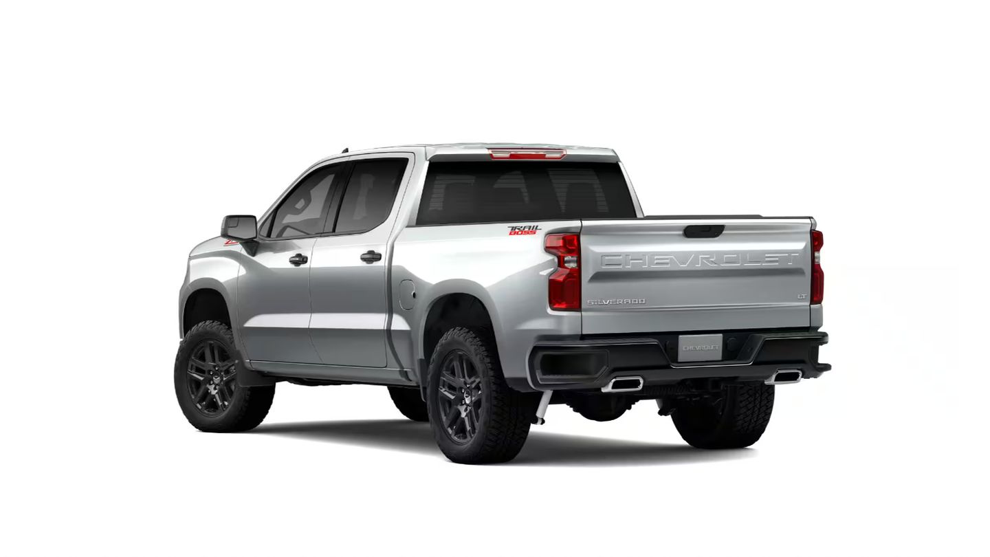 2026 Chevrolet Silverado Trail Boss - Rear three-quarter studio view of a silver 2026 Chevrolet Silverado Trail Boss pickup truck - City Chevrolet, Buick, GMC - New car dealership in Toronto, Ontario