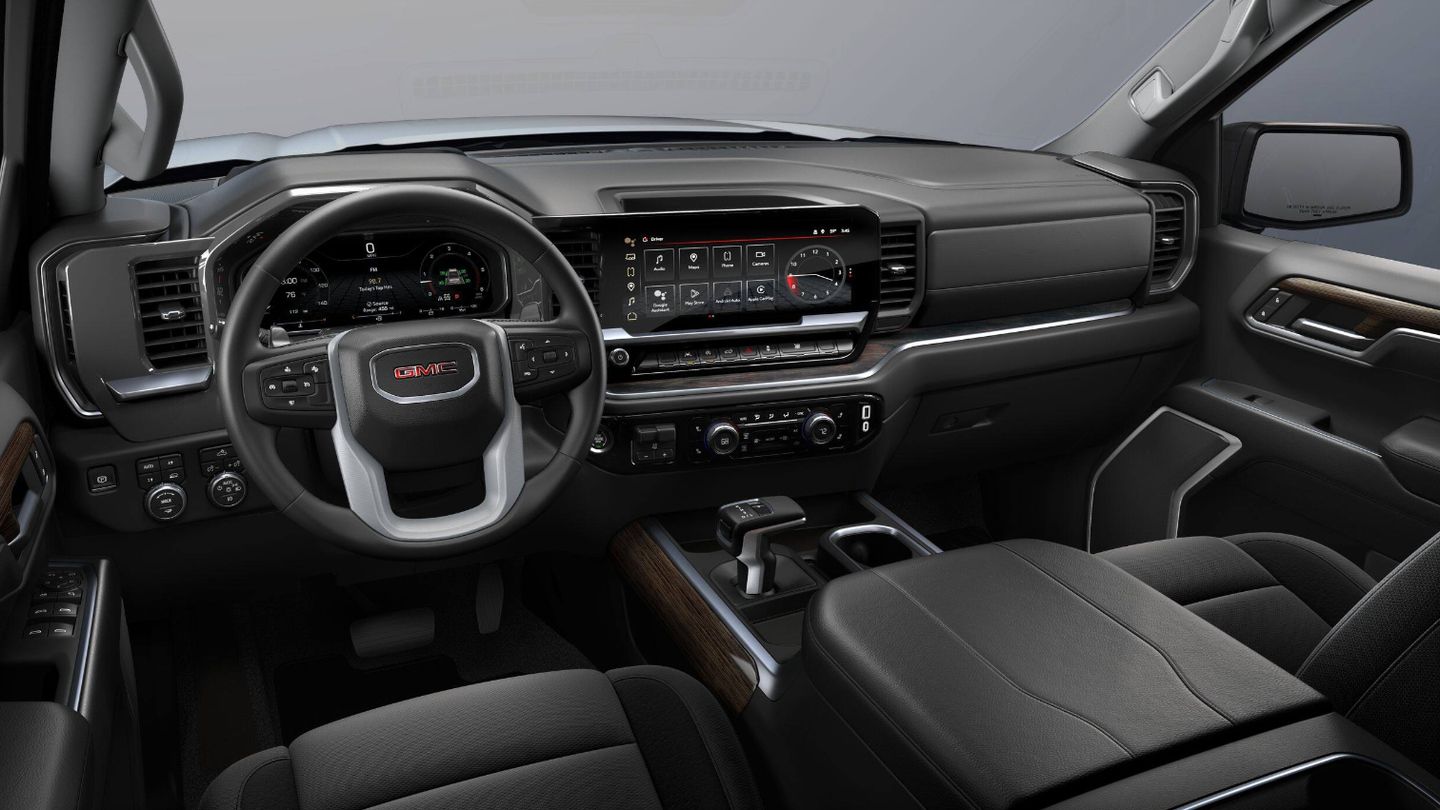 2026 GMC Sierra - Interior view of the dashboard, steering wheel, and infotainment screen of a GMC Sierra - Humberview Chevrolet, Buick, GMC - New car dealership in Toronto, Ontario