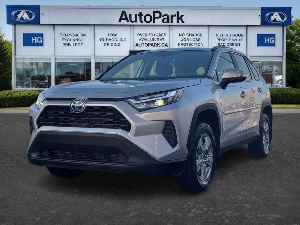 2026 Toyota RAV4 - Front three-quarter view of a silver 2026 Toyota RAV4 Hybrid parked in front of the dealership - AutoPark Brampton - New car dealership in Brampton, Ontario