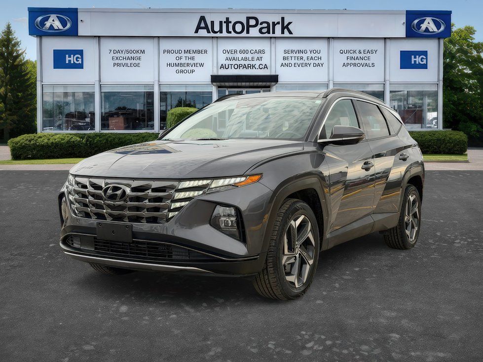 2026 Hyundai Tucson - Front three-quarter view of a dark grey 2026 Hyundai Tucson parked in front of the dealership building - AutoPark Brampton - New car dealership in Brampton, Ontario