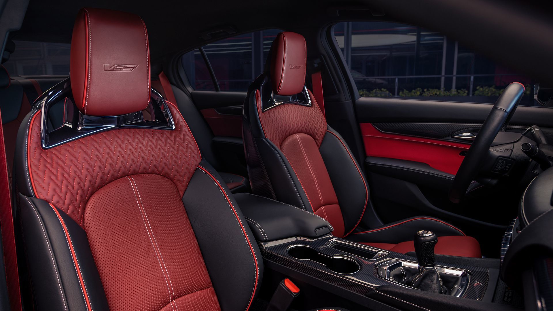 2026 Cadillac CT5-V Blackwing - Interior view of the 2026 Cadillac CT5-V Blackwing Curated by Cadillac showing the red and black leather front seats and center console - Applewood Cadillac - Cadillac new car dealership in Mississauga, Ontario
