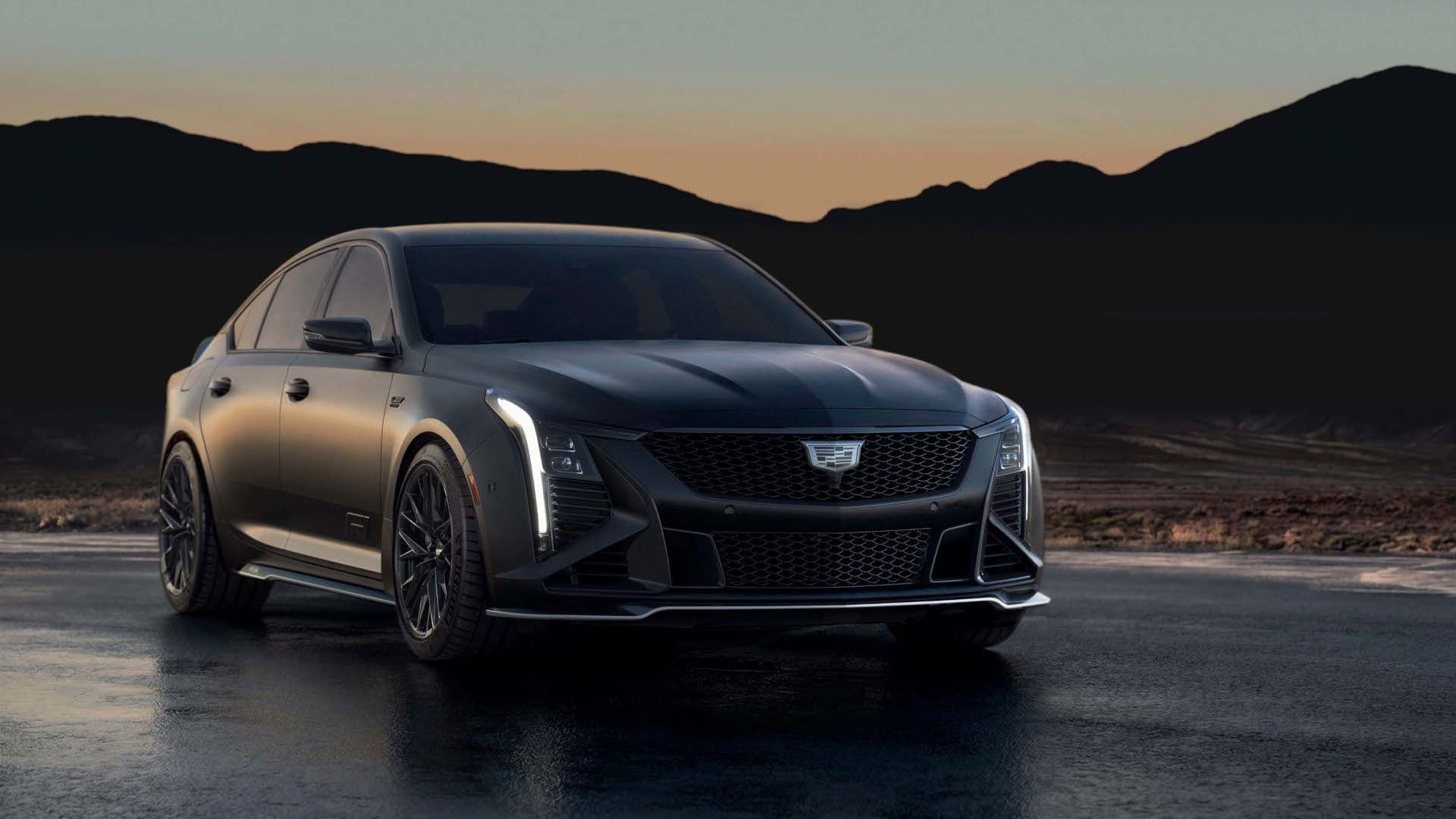 2026 Cadillac CT5-V Blackwing - Front three-quarter view of a matte black 2026 Cadillac CT5-V Blackwing F1 Collector Series parked at sunset - Applewood Cadillac - Cadillac new car dealership in Mississauga, Ontario