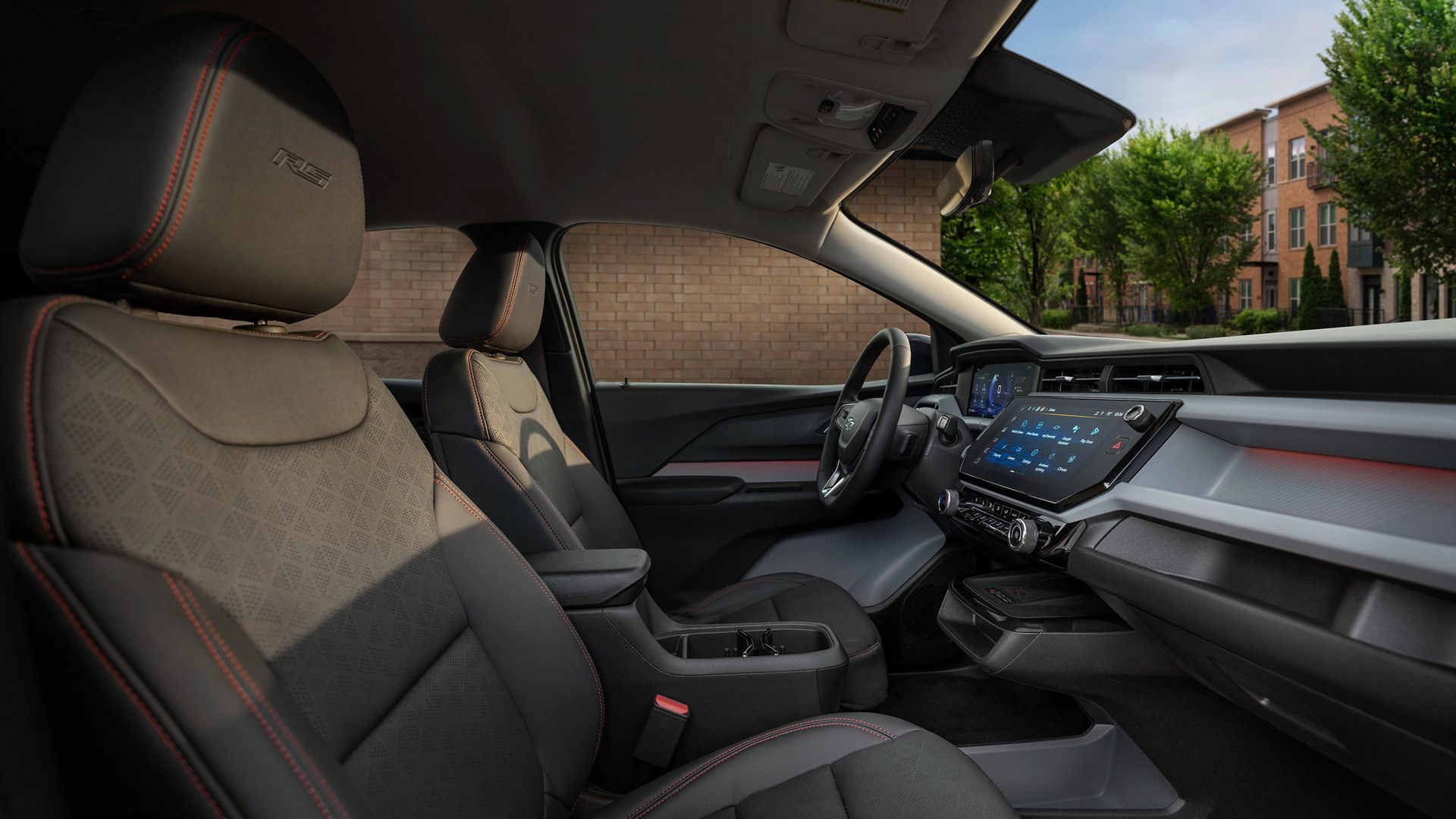 2027 Chevrolet Bolt - interior view of the 2027 Chevrolet Bolt's front cabin and steering wheel - City Chevrolet, Buick, GMC - Chevrolet new car dealership in Toronto, Ontario