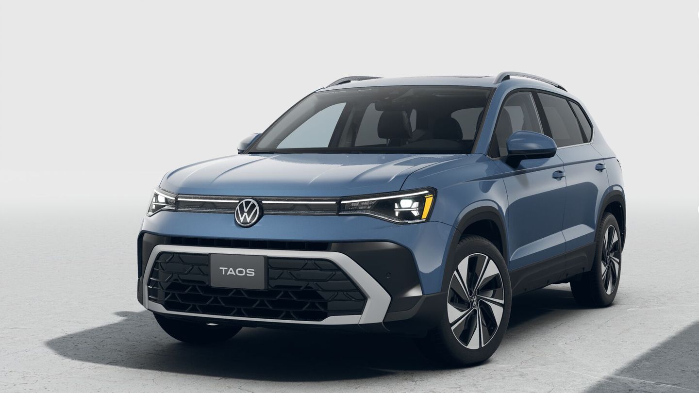 2026 Volkswagen Taos - Front three-quarter view of a blue 2026 Volkswagen Taos with headlights on - Humberview Volkswagen - New car dealership in Toronto, Ontario