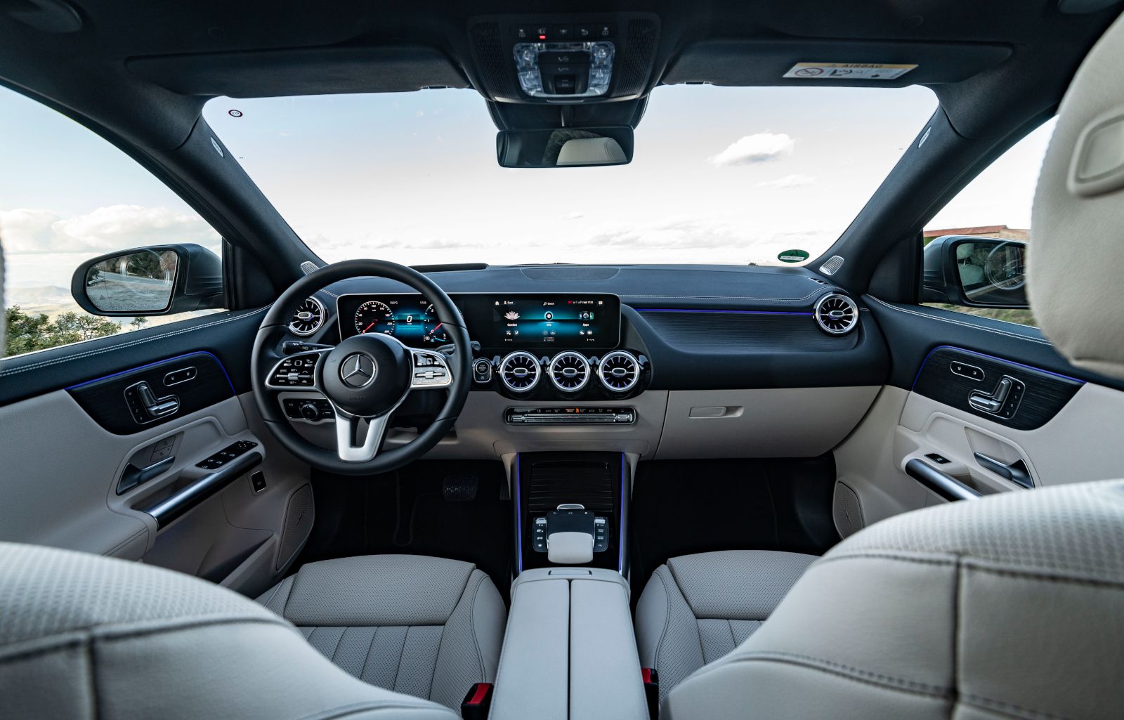 2026 Mercedes-Benz GLA - interior view of the front dashboard, steering wheel, and digital infotainment display - Mercedes-Benz Brampton - New car dealership in Brampton, Ontario