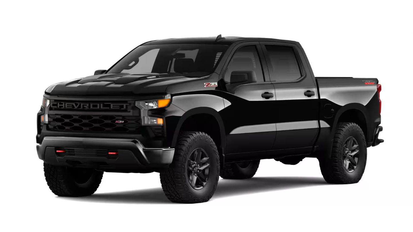 2026 Chevrolet Silverado Trail Boss - Front driver side profile view of a black 2026 Chevrolet Silverado Trail Boss over a white background - Humberview Chevrolet, Buick, GMC - New car dealership in Toronto, Ontario