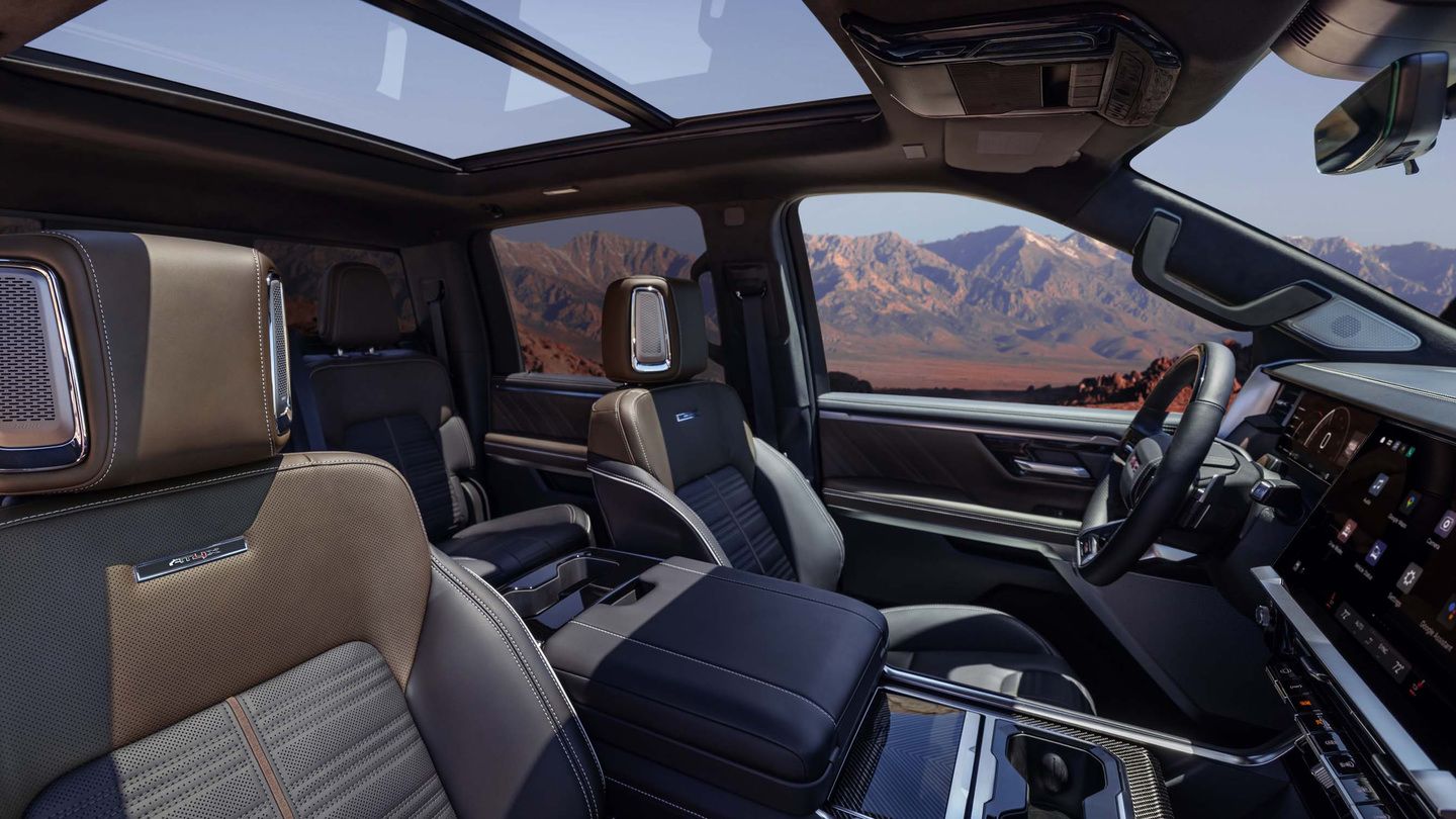2027 GMC Sierra - interior view of the 2027 GMC Sierra AT4X cabin featuring leather seats, dashboard, and panoramic sunroof - Applewood Chevrolet, Buick, GMC - New car dealership in Mississauga, Ontario