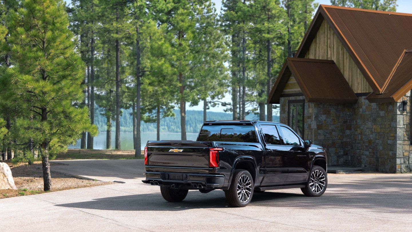 2027 Chevrolet Silverado - rear three-quarter view of a black 2027 Chevrolet Silverado High Country parked on a paved driveway - Humberview Chevrolet, Buick, GMC - New car dealership in Toronto, Ontario