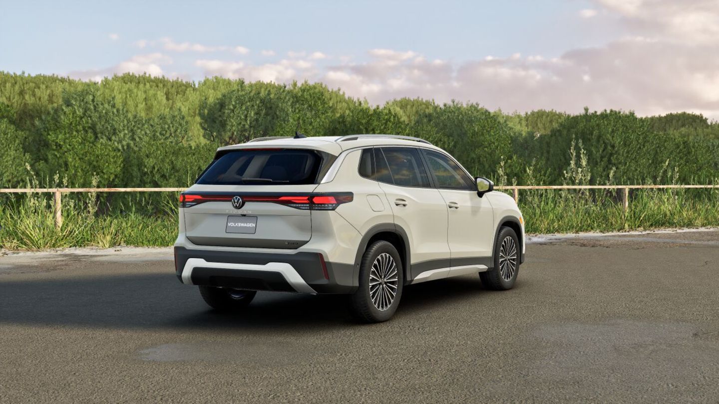 2026 Volkswagen Tiguan - rear three-quarter view of a white 2026 Volkswagen Tiguan parked outdoors - Humberview Volkswagen - Volkswagen new car dealership in Toronto, Ontario