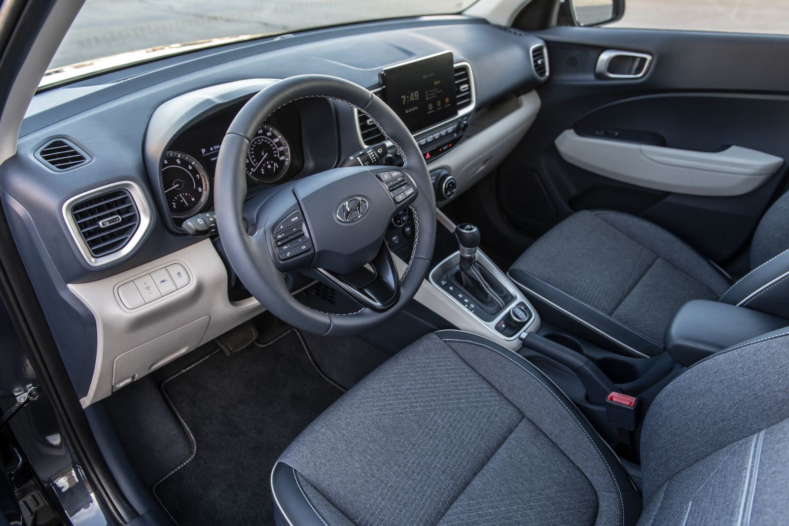 2026 Hyundai Venue - interior view of the 2026 Hyundai Venue dashboard, steering wheel, and front seats - Cooksville Hyundai - Hyundai new car dealership in Mississauga, Ontario