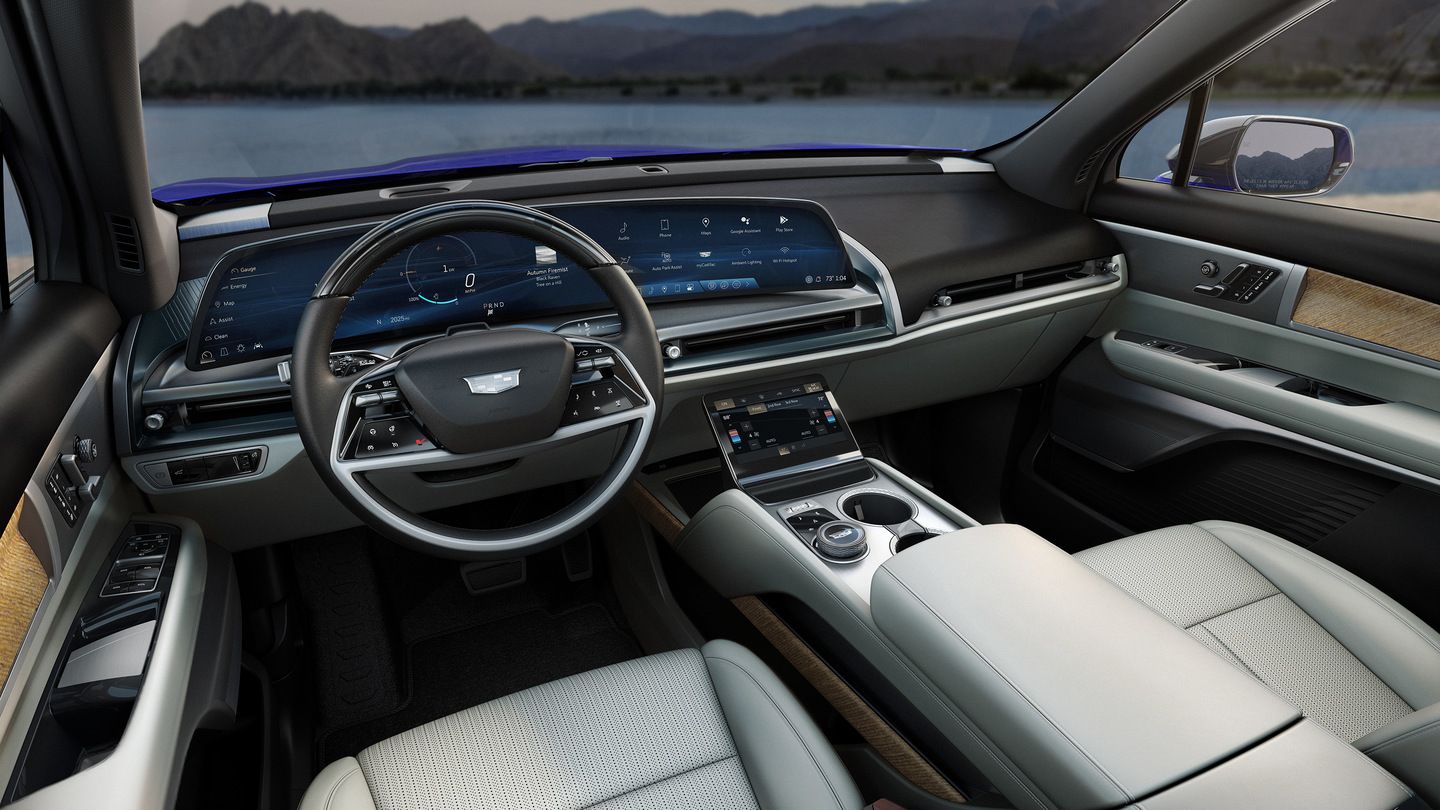 2026 Cadillac VISTIQ - interior view of the 2026 Cadillac VISTIQ steering wheel, dashboard, and curved pillar-to-pillar infotainment display - Applewood Cadillac - Cadillac new car dealership in Mississauga, Ontario