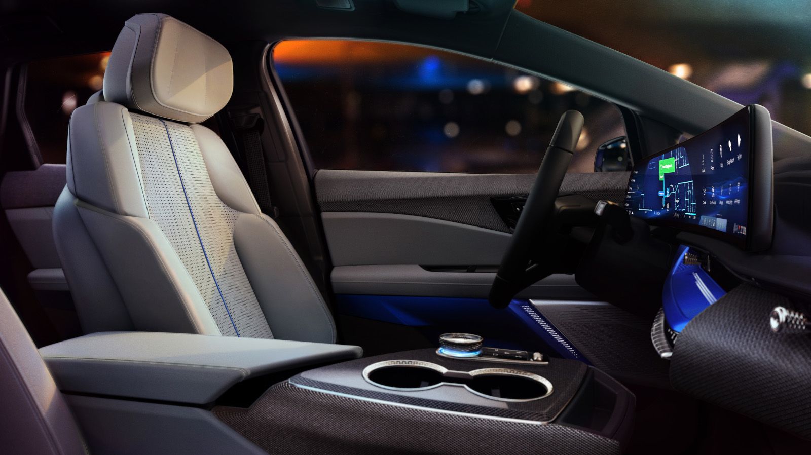2026 Cadillac OPTIQ - interior view of the driver's side cabin, showing the light gray seat and large digital curved display - City Cadillac - Cadillac new car dealership in Toronto, ON