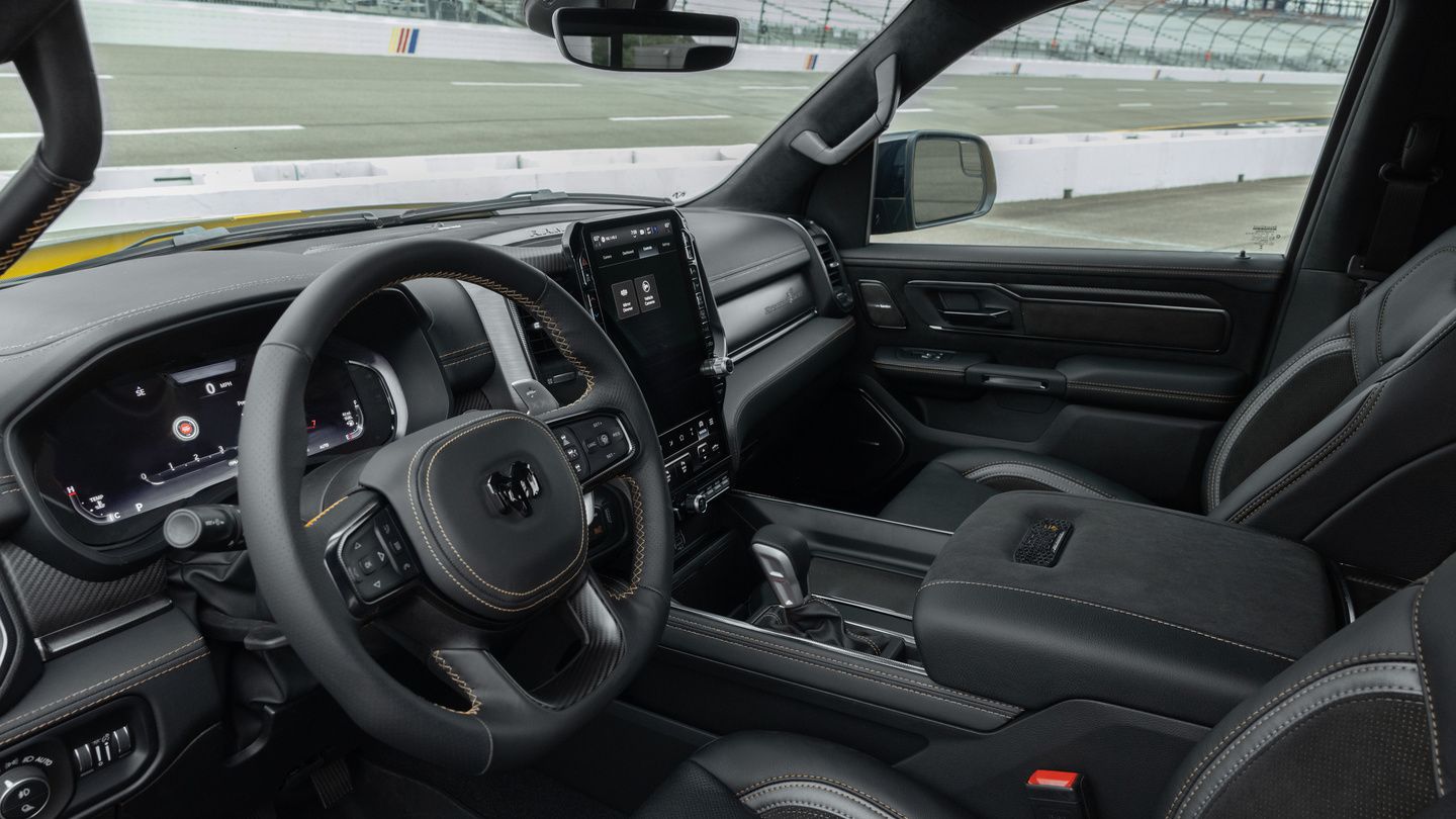 2027 Ram 1500 Rumble Bee - interior view of the 2027 Ram 1500 Rumble Bee cabin, steering wheel, and infotainment center - Cooksville Dodge - Ram new car dealership in Mississauga, Ontario