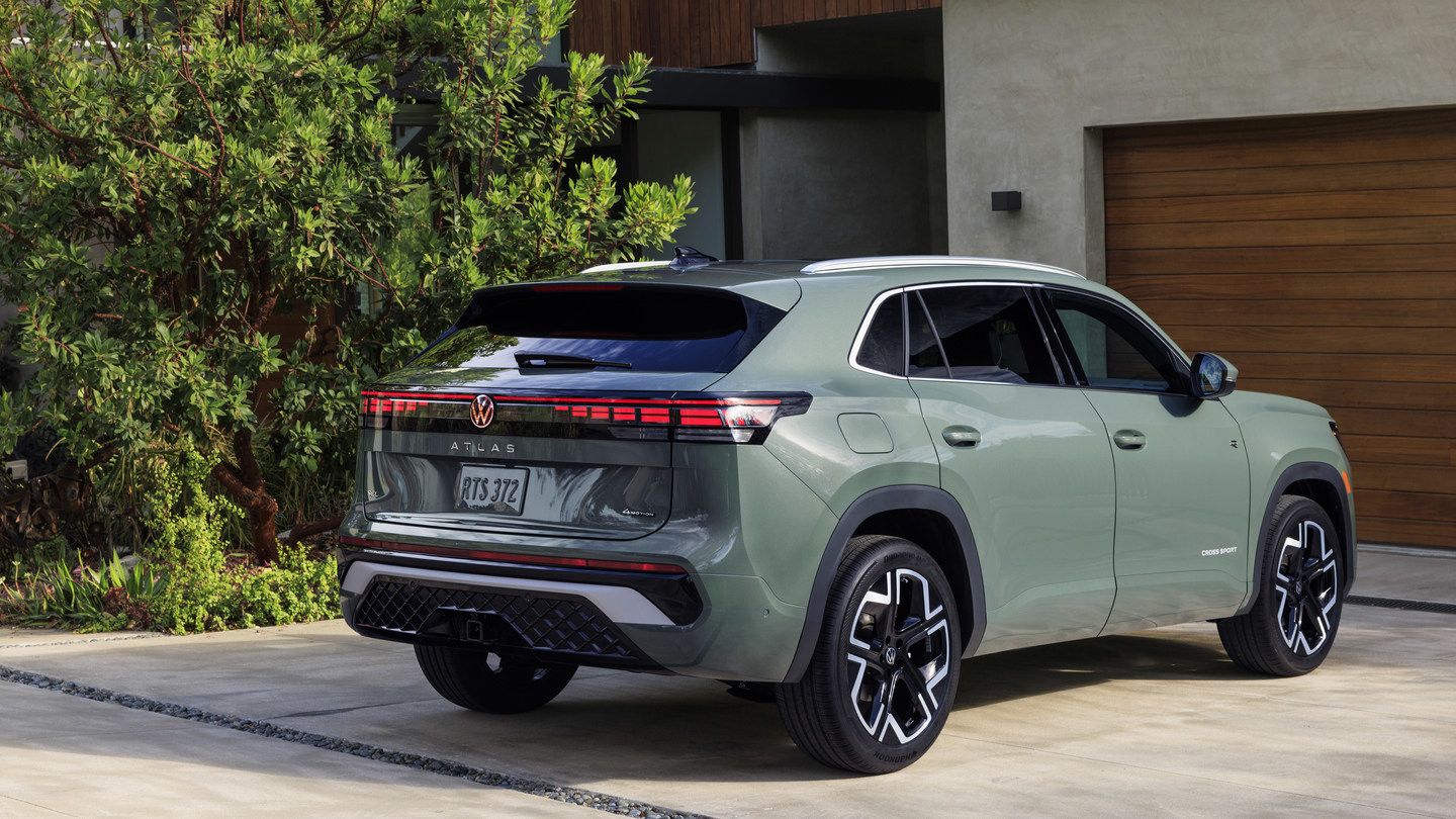 2027 Volkswagen Atlas Cross Sport - rear three-quarter view of a sage green 2027 Volkswagen Atlas Cross Sport showing taillights and tailgate - Volkswagen Midtown Toronto - Volkswagen car dealership in Toronto, Ontario