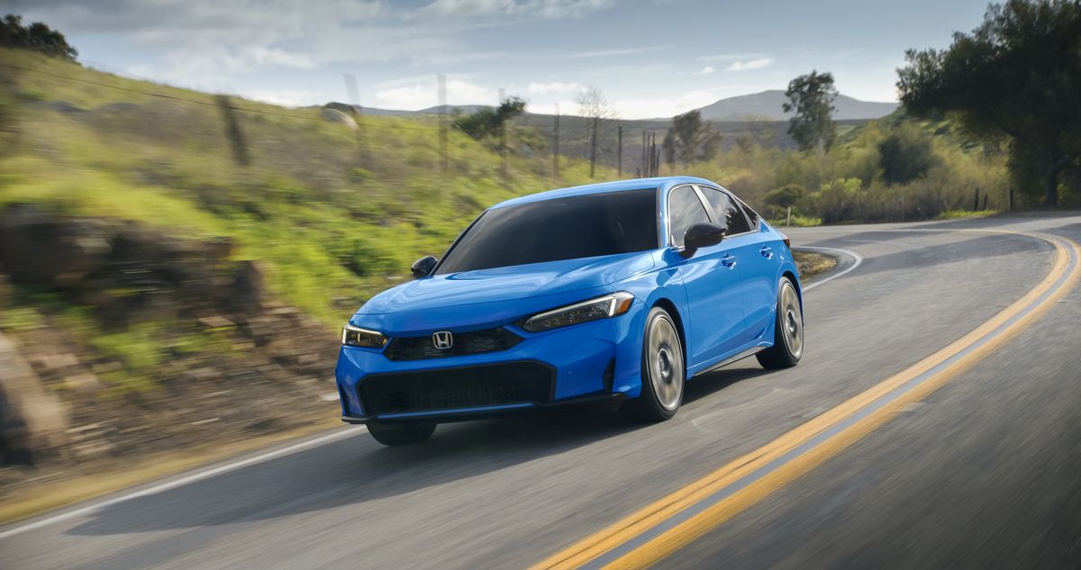 2026 Honda Civic - a blue 2026 Honda Civic driving along a winding mountain road - Humberview Group - New car dealerships in Ontario