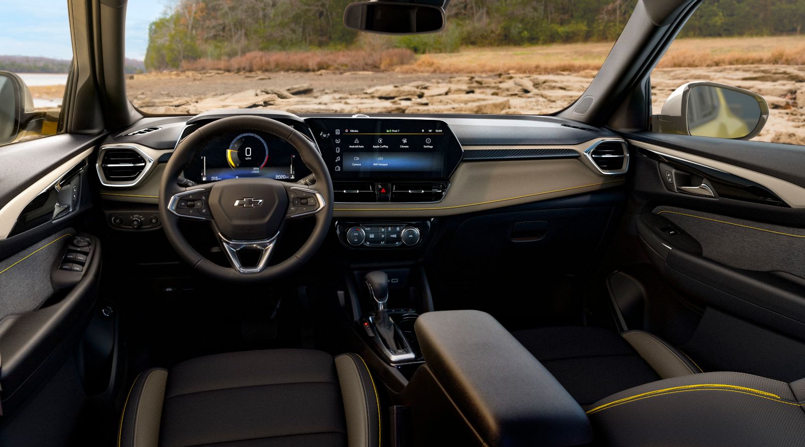 2026 Chevrolet Trailblazer - interior view of the driver's side and dashboard of a 2026 Chevrolet Trailblazer with yellow stitching - Applewood Chevrolet, Buick, GMC - New car dealership in Mississauga, Ontario