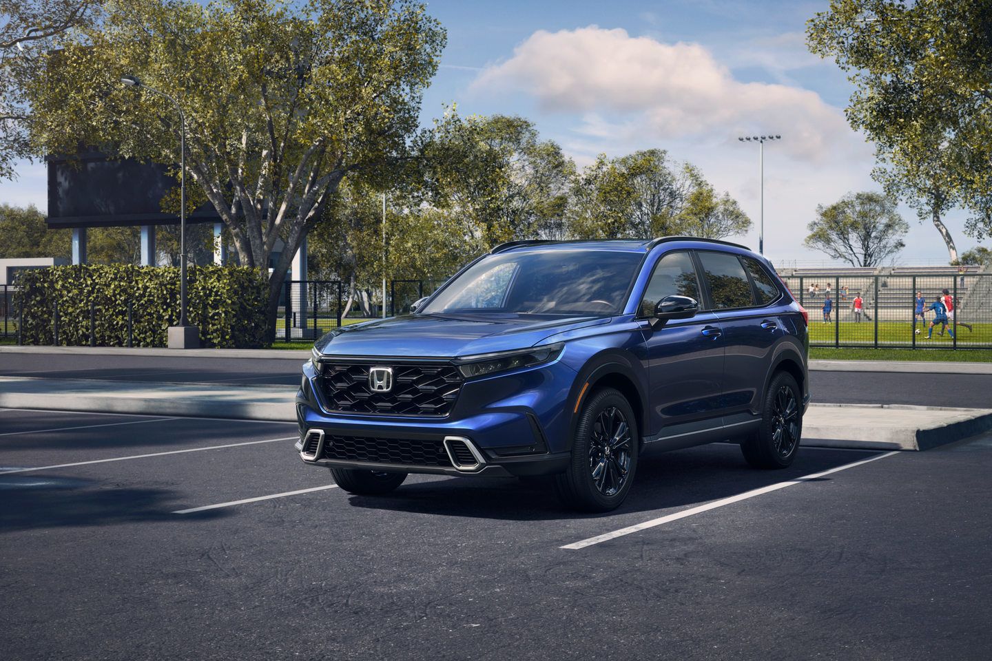 2026 Honda CR-V - a blue 2026 Honda CR-V parked in a paved lot - Humberview Group - New car dealerships in Ontario