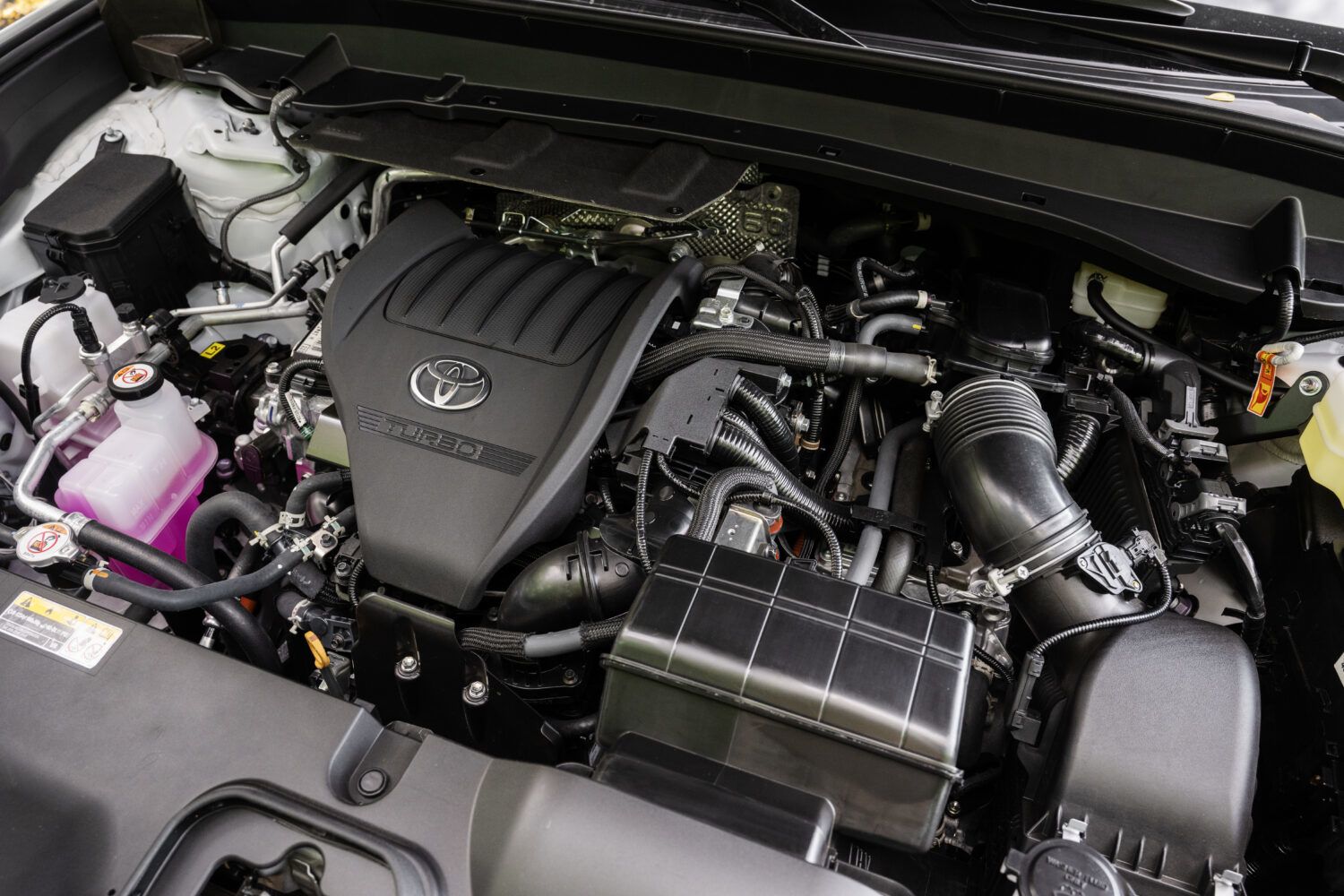 2026 Toyota Grand Highlander - Overhead view of the 2026 Toyota Grand Highlander 2.4L turbo engine bay - Orangeville Toyota - Toyota new car dealership in Orangeville, Ontario