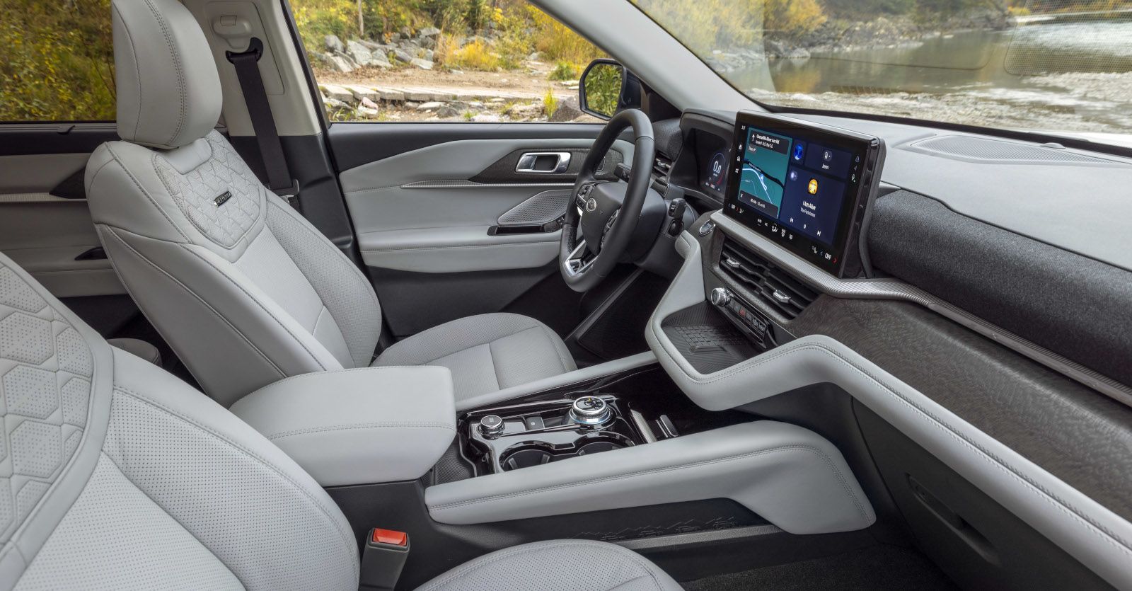 2027 Ford Explorer - interior view of the 2027 Ford Explorer front cabin, leather seating, and dashboard display screen - Bayfield Ford - Ford new car dealership in Barrie, Ontario