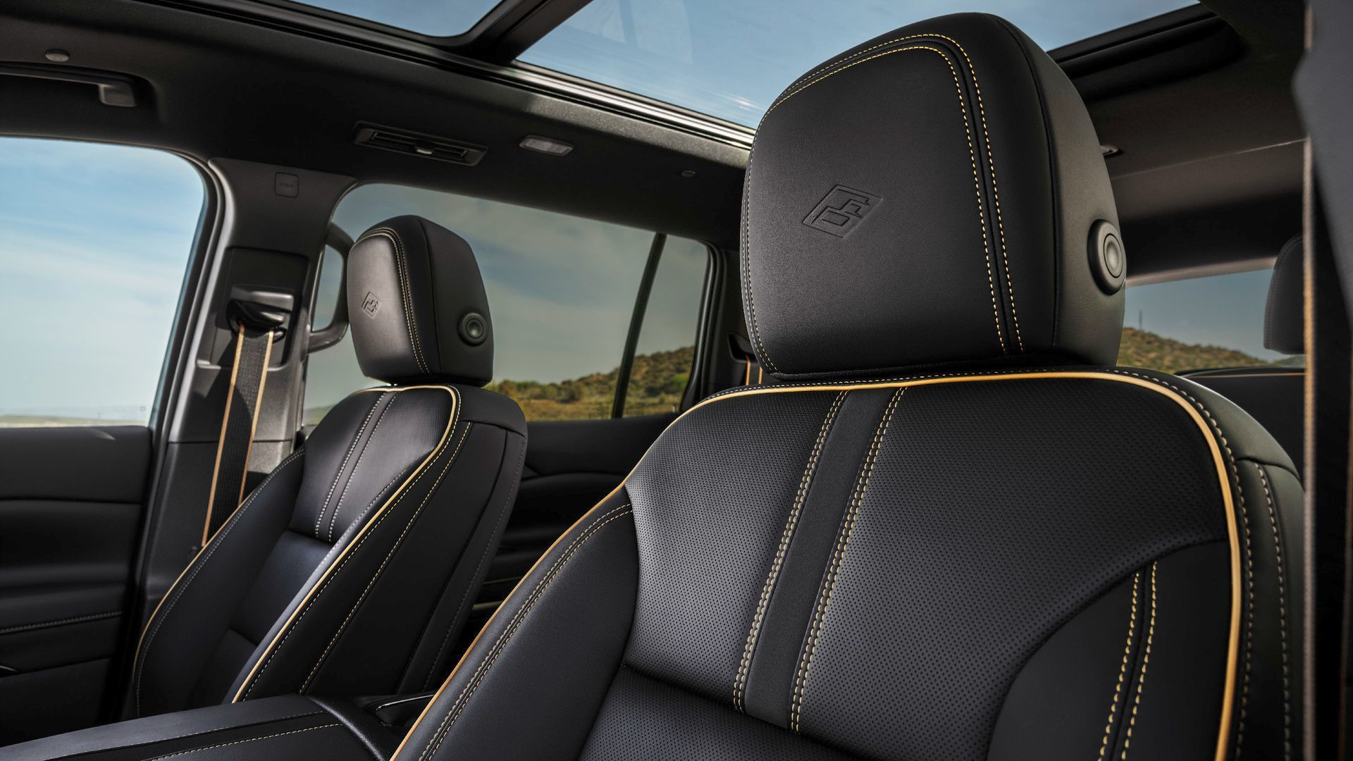 2027 Chevrolet Traverse - close-up view of the 2027 Chevrolet Traverse High Country perforated leather front seats and headrests - City Chevrolet, Buick, GMC - New car dealership in Toronto, Ontario