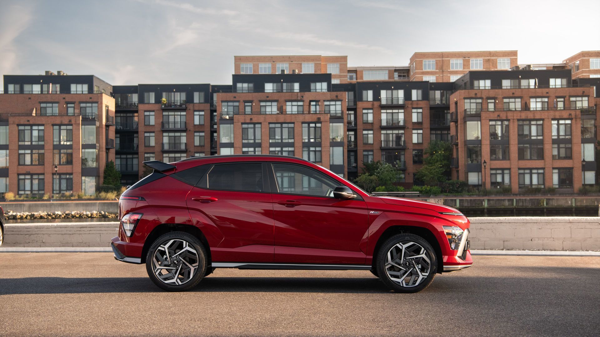 2027 Hyundai Kona - profile view of the vehicle on an asphalt lot - Cooksville Hyundai - New car dealership in Mississauga, Ontario
