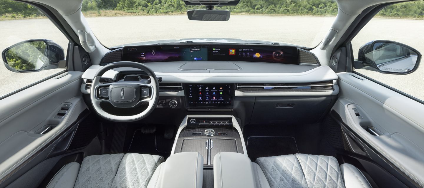 2027 Lincoln Navigator - interior view of a 2027 Lincoln Navigator showcasing the panoramic dashboard display, steering wheel, and front cabin - Mayfield Lincoln - Lincoln new car dealership in Brampton, Ontario