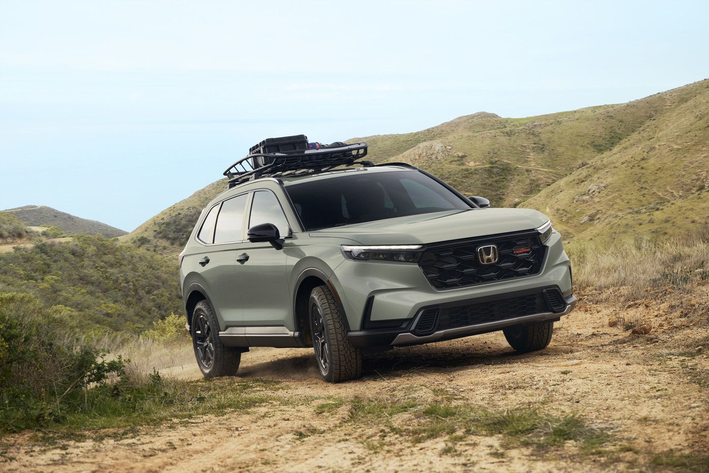 2027 Honda CR-V - a 2027 Honda CR-V driving on an off-road dirt trail - Goderich Honda - Honda car dealership in Goderich, Ontario