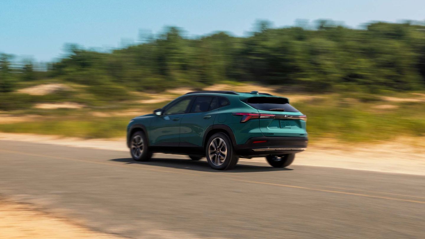 2027 Chevrolet Trax - rear three-quarter view of a teal 2027 Chevrolet Trax driving on a paved road - Humberview Chevrolet Buick GMC - Chevrolet car dealership in Toronto, Ontario