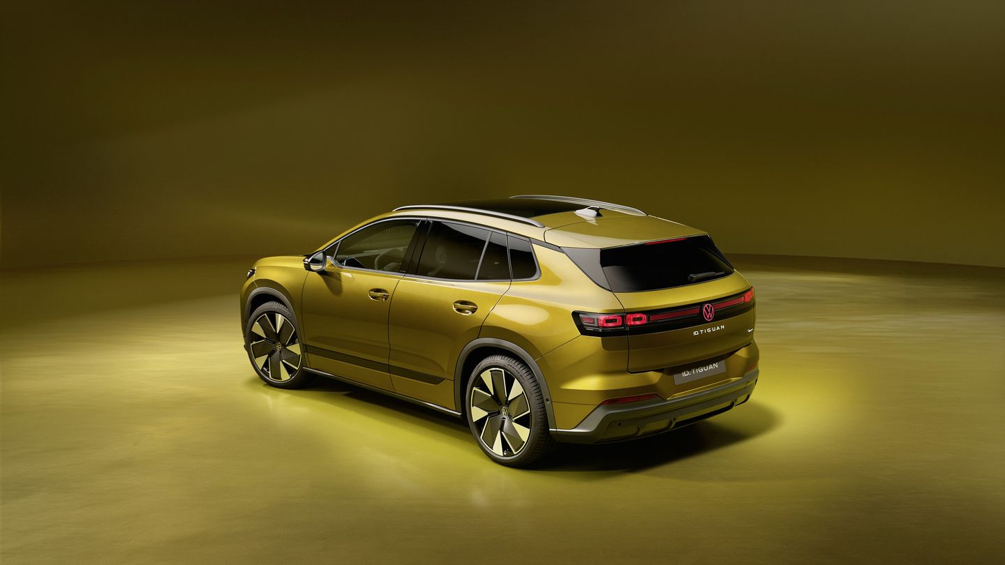 2027 Volkswagen ID. Tiguan - rear three-quarter view of a yellow-gold 2027 Volkswagen ID. Tiguan - Humberview Volkswagen - New car dealership in Toronto, Ontario