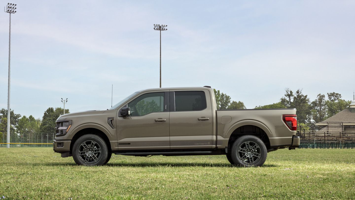 2027 Ford F-150 - profile view of a tan 2027 Ford F-150 parked on a grass field - Humberview Group - New car dealerships in Ontario