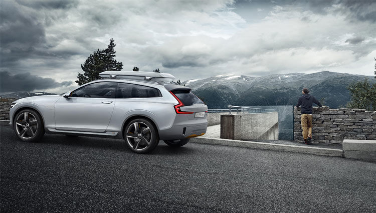 VOLVO XC50, THE SWEDISH COUPE SUV - Man Stands in Gloomy Weather Next To Volvo XC50