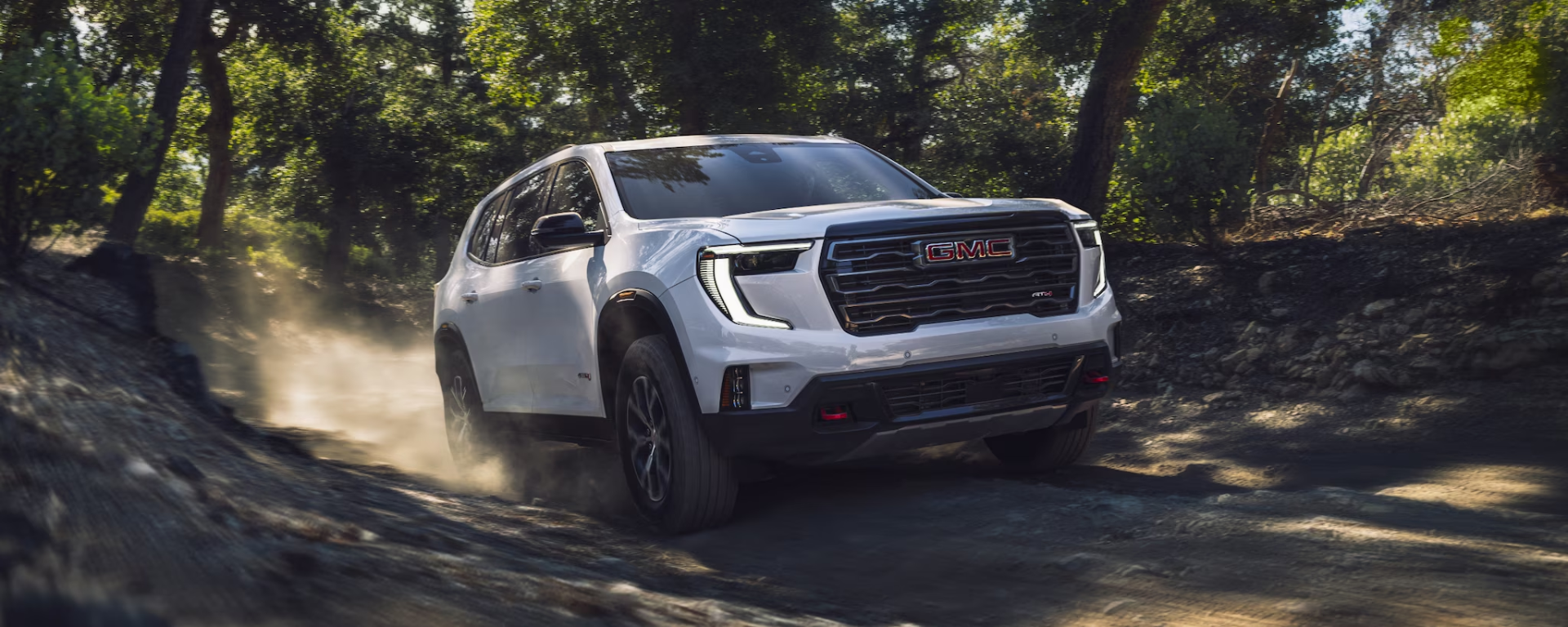 GMC Acadia 2024, caractéristiques du GMC Acadia, VUS intermédiaires, VUS de luxe, technologie SUV, VUS tout-terrain, marché des VUS au Québec, versions du GMC Acadia, Acadia Élévation, Acadia Denali, Acadia AT4, technologie de conduite mains libres, technologie Super Cruise, fonctionnalités de sécurité SUV, confort des SUV, systèmes d'infodivertissement avancés, performance GMC, innovation dans le design des SUV, VUS familiaux, meilleurs VUS 2024,